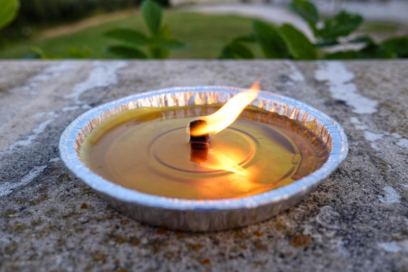 citronella candle used to repel mosquitos
